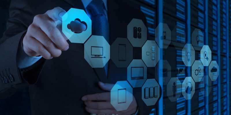 Businessman working with a Cloud Computing diagram on the new computer interface